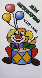 Clown mit Trommel und Luftballon