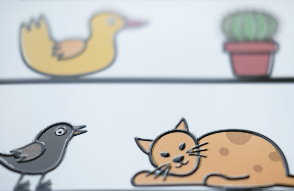 Taktile Illustrationen von einem Vogel und einer Katze
