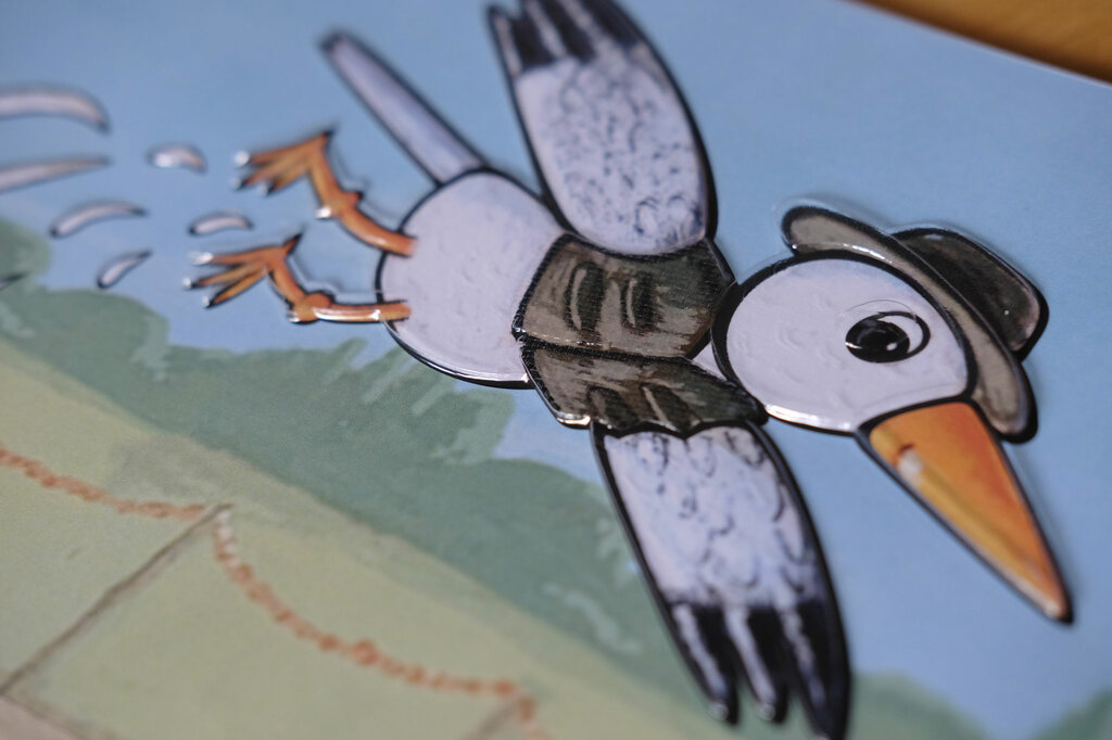 Tastbare Abbildung einer fliegenden Möwe mit Hut