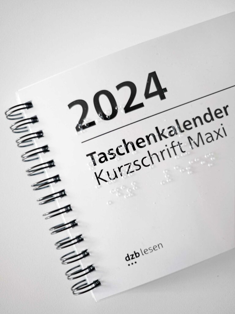 Vorderseite Taschenkalender 2024 in Kurzschrift mit Ringbindung