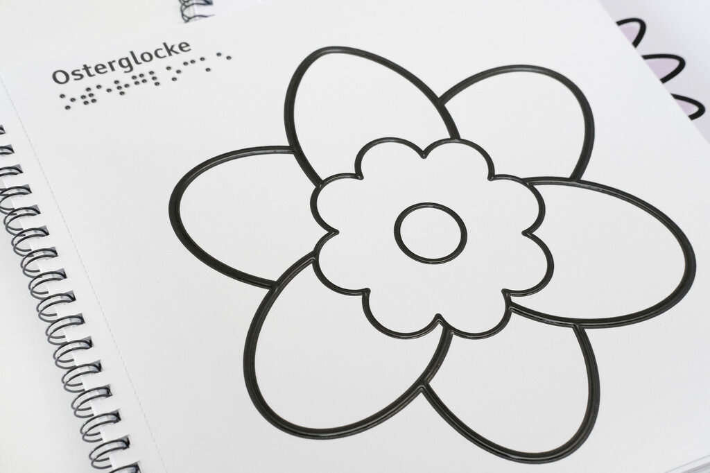 Ringbuch mit tastbaren Lack-Konturen einer Blüte zum Ausmalen