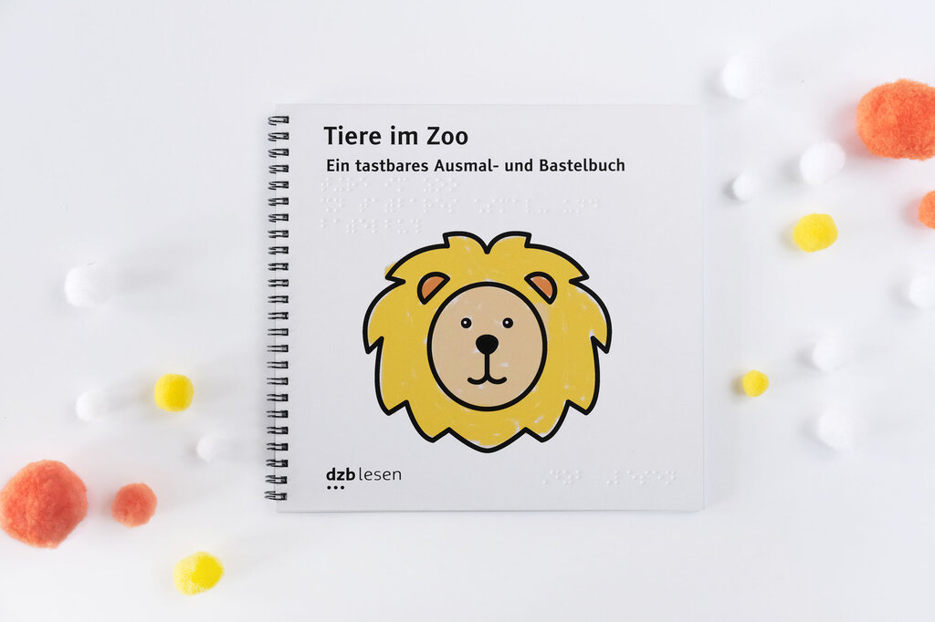 Buchcover Ausmalbuch »Tiere im Zoo«, Löwenkopf mit wuscheliger Mähne