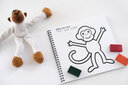 Vergrößerungsansicht: Ausmalbuch mit Affe in tastbaren Konturen zum Ausmalen