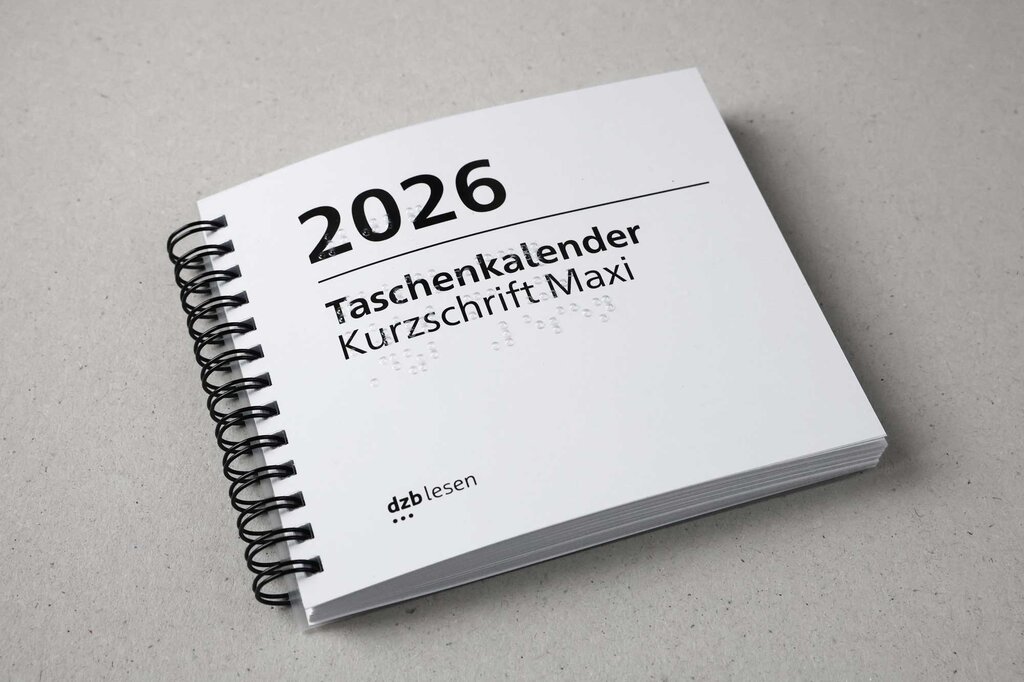 Vorderseite Taschenkalender 2026 in Kurzschrift mit Ringbindung