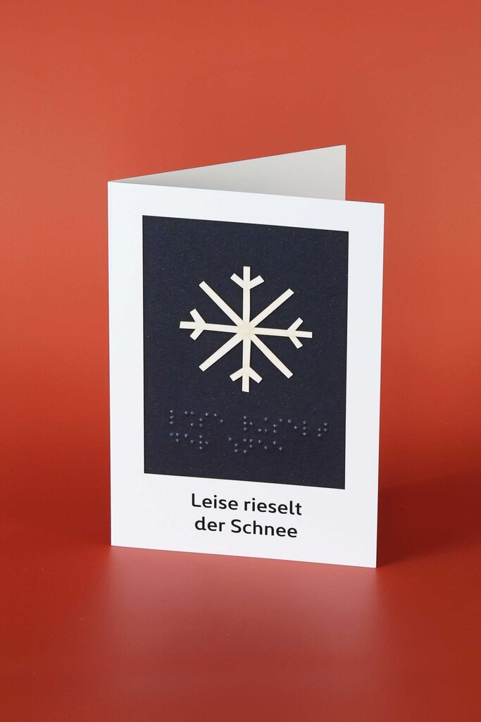Klappkarte aus Papier mit taktil gestalteter Schneeflocke